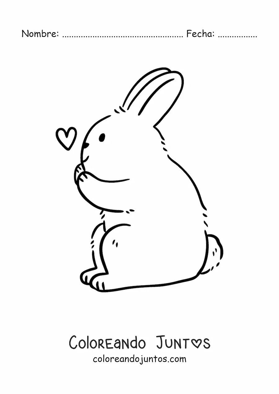 Imagen para colorear de un conejo sentado de perfil con un corazón pequeño en el aire