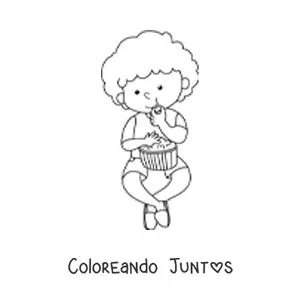 Imagen para colorear de un niño sentado comiendo palomitas